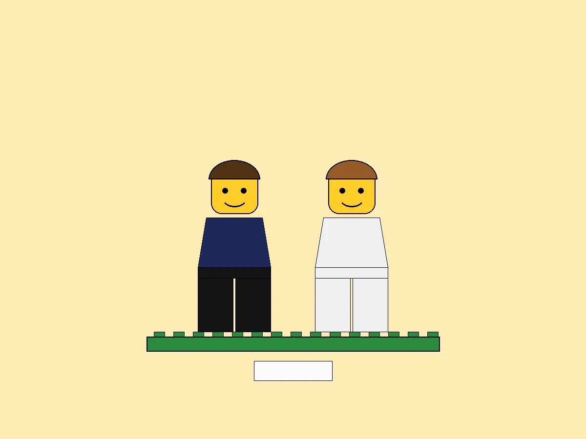Illustrative mockup: two brick-built minifigures of a couple on a green display base